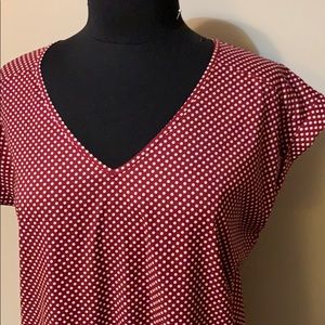 Polka dotted blouse.